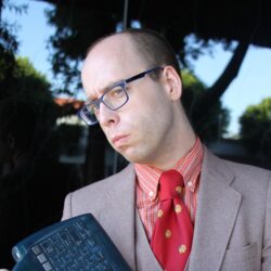 Nerdy headshot for my second book, Post-Modem: The Interwebs Explained.
